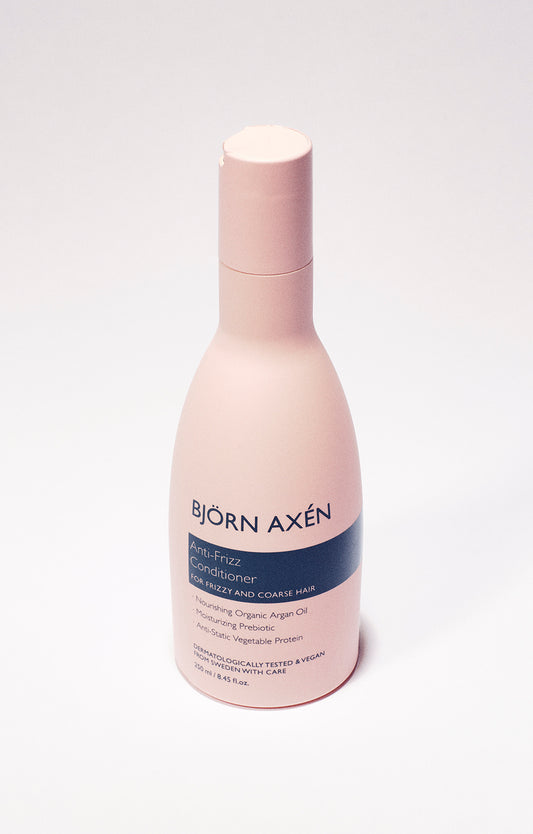 A nourishing conditioner to soften and smooth coarse and frizzy hair