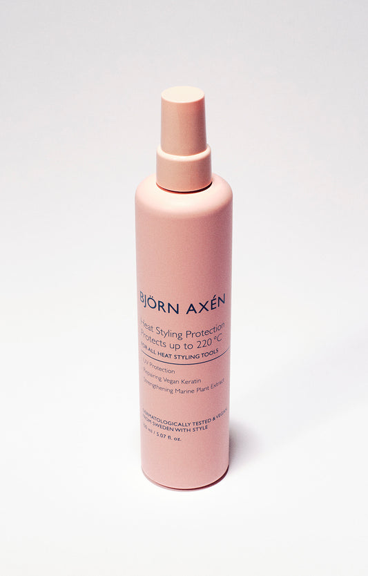 A spray that nourishes the hair while providing heat and UV protection