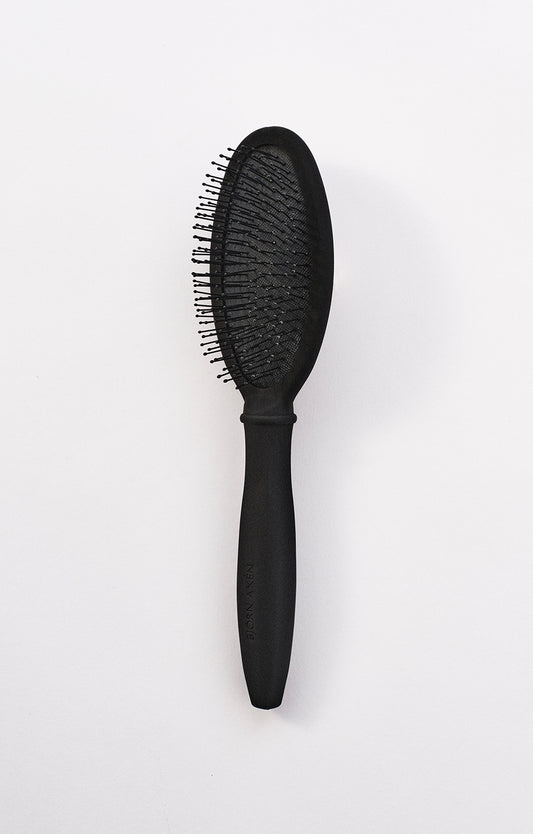 A detangling brush that is gentle on the hair and scalp