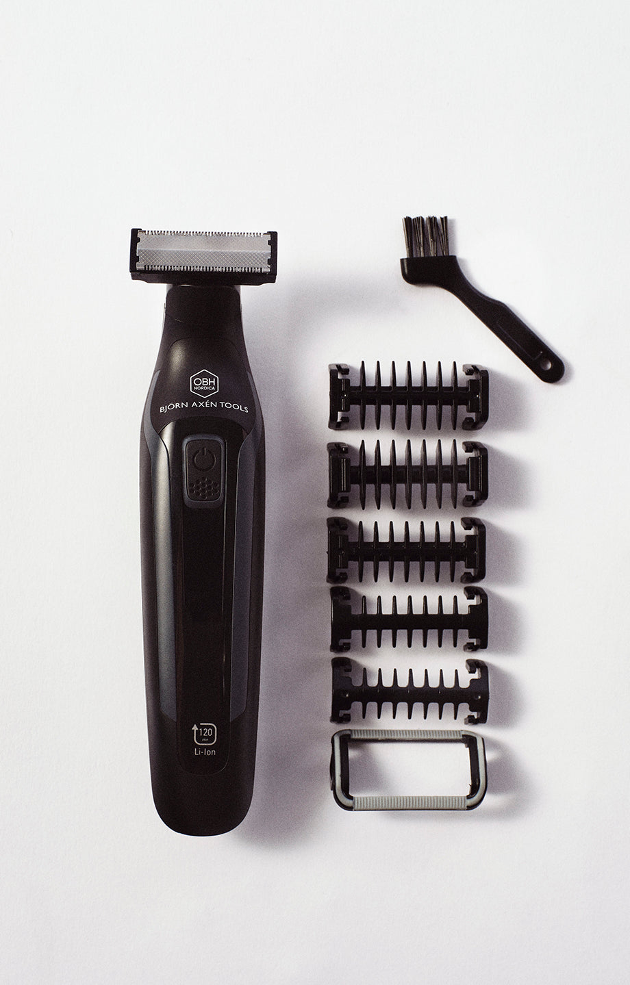 A professional trimmer for shaving and trimming both facial and body hair