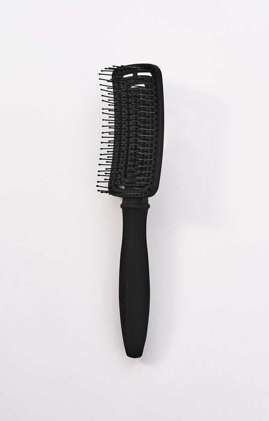 A detangling and styling brush in one